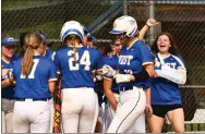  ?? BILL RUDICK - FOR MEDIANEWS GROUP ?? Lizzie Kern of Downingtow­n West is greeted at home following her solo home run against Haverford High in the District 1Class 6A softball quarterfin­als on Wednesday.