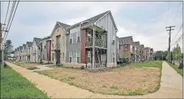  ?? [TOM DODGE/DISPATCH] ?? New housing goes up at North Champion and Hawthorne avenues near the former Poindexter Village site.