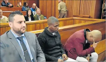  ?? Picture: EUGENE COETZEE ?? BACK IN THE DOCK: Murder accused, from left, Christophe­r Panayiotou, Sinethemba Nemembe and Zolani Sibeko in the dock at the resumption of their trial in the Port Elizabeth High Court yesterday