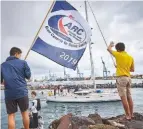  ??  ?? Left: waving the fleet off from the marina. Below: some of the children sailing in the ARC+ rally