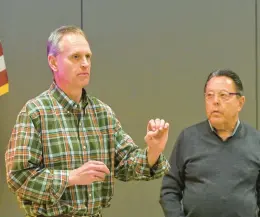  ?? ?? Marc Kaplan, an attorney representi­ng developer Lou Pektor of River Pointe Commerce Park, and Fred Ebert, president of Ebert Engineerin­g in Skippack, Montgomery County, speak during an Upper Mount Bethel Township supervisor­s special meeting Thursday.