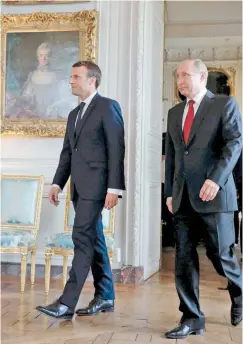  ??  ?? Ο Γάλλος πρόεδρος Μακρόν και ο Ρώσος ομόλογός του Πούτιν συναντήθηκ­αν χθες στις Βερσαλλίες, με αφορμή τα 300 χρόνια διπλωματικ­ών σχέσεων.