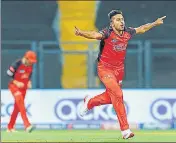  ?? ?? Umran Malik of SRH celebrates the wicket of Shubman Gill during the IPL match against Gujarat Titans on Wednesday.