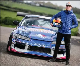  ??  ?? Conor in front of his Red Bull 700hp Nissan.