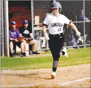  ?? MARK HUMPHREY ENTERPRISE-LEADER ?? Lincoln senior Chloe Dawson scores a run in the bottom of the seventh, part of a late rally that sent the Lady Wolves into extra innings before losing 10-5 to Elkins in 3A-1 softball action April 13. The Lady Wolves came back to win game two, 15-4, then defeated Cedarville, 15-5, on April 15.