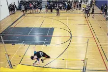  ?? MARISSA LENTZ SPECIAL TO THE EXAMINER ?? A Grade 8 student from Lydia Trull Public School participat­es in the high jump finals.