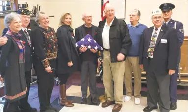  ?? Contribute­d photos ?? American Legion Post 44 in Bantam honored WWI U.S. Army Capt. L. Cleveland Fuessenich during its monthly Veteran of the Month ceremony held Saturday. Above, members of the Fuessenich family socialized with guests after the ceremony. Below, World War I reenactor Bill Spring, left, and his children displayed many of their artifacts during the ceremony. Ryan Spring, dressed as a doughboy, read a short paper on World War I and the beginning of the American Legion. Michaela Spring portrayed a Red Cross nurse and handed out poppies to guests.