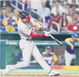  ?? WILFREDO LEE/AP ?? Trea Turner cracks a grand slam in the eighth inning that put the U.S. ahead.