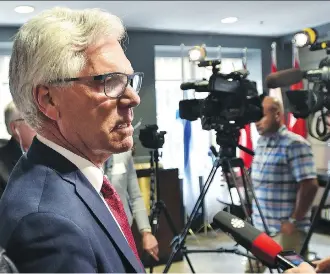 ?? ED KAISER ?? Natural Resources Minister Jim Carr speaks to the media after he spoke to the Edmonton business community on Thursday regarding Canada’s energy future.