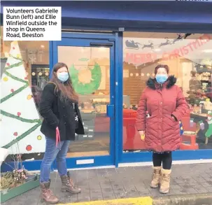  ??  ?? Volunteers Gabrielle Bunn (left) and Ellie Winfield outside the shop in Queens Road, Beeston