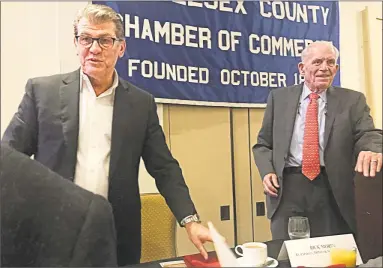  ?? Cassandra Day / Hearst Connecticu­t Media ?? University of Connecticu­t women’s basketball coach Geno Auriemma, left, delivered the keynote address at Monday’s Middlesex County Chamber of Commerce member breakfast at the Cromwell Radisson ahead of the NCAA tournament bracket release Monday...