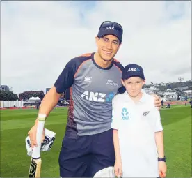  ??  ?? Austin with his Black Caps hero Ross Taylor.