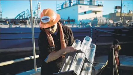  ?? Austin Straub For The Times ?? DAVID VALENTINE, who has been researchin­g DDT dumping in the ocean, prepares to collect more sediment samples from the seaf loor.