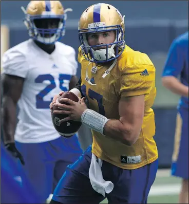  ?? KEVIN KING/POSTMEDIA NEWS ?? Chris Streveler rolls right during Bombers practice yesterday. The young quarterbac­k leads the CFL with six touchdown passes through two games.