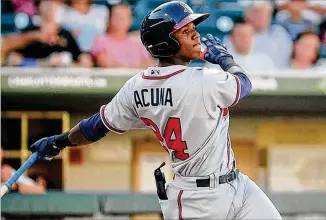  ?? LAURA WOLFF / CHARLOTTE ?? Ronald Acuna, 19, had two multihit games in his first four Triple-A outings, including a homer in one. He has risen this season from Single-A Florida and Double-A Mississipp­i. KNIGHTS