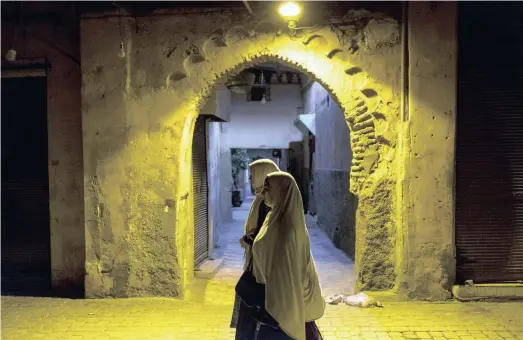  ??  ?? NIGHT in one of the many souks, or markets, in the medina of Marrakech.| The New York Times