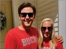  ?? SUBMITTED PHOTO ?? Former Archbishop Carroll athlete Gabby Capuzzi, right, who earned All-Delco honors in soccer and lacrosse in high school and was a second-team All-American lacrosse player at Ohio State, poses with husband Greg Solomon, a former Ohio State baseball player.