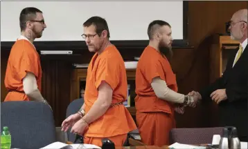  ?? J. SCOTT PARK — JACKSON CITIZEN PATRIOT ?? Paul Bellar, left, Pete Musico and Jospeh Morrison appear for sentencing in front of Jackson County Circuit Court Judge Thomas Wilson on Thursday in Jackson, Mich. The judge on Thursday handed down the longest prison terms so far in the plot to kidnap Michigan’s governor, sentencing three men who forged an early alliance with a leader of the scheme before the FBI broke it up in 2020.