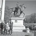  ?? MARY ALTAFFER/AP ?? The statue of Theodore Roosevelt outside the entrance of the American Museum of Natural history in New York will be removed. Roosevelt’s horse is flanked by Native American and African American men.