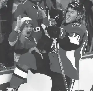  ?? THE CANADIAN PRESS ?? Ottawa forward Ryan Dzingel celebrates after scoring on the Sharks on Friday night.