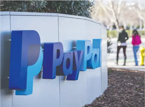  ?? DAVID PAUL MORRIS / BLOOMBERG ?? Paypal shares have climbed by more than 80 per cent this year as more retailers have moved online.