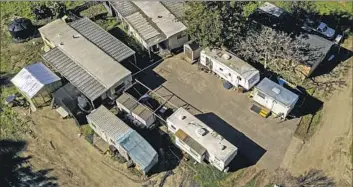  ?? Santiago Mejia Associated Press ?? MOBILE HOMES at California Terra Garden, where four farmworker­s were among those killed Monday.