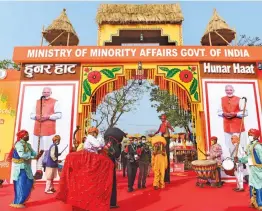  ?? — PTI ?? Artists perform during the inaugurati­on of the 26th edition of Hunar Haat at Jawaharlal Nehru Stadium in New Delhi on Sunday.