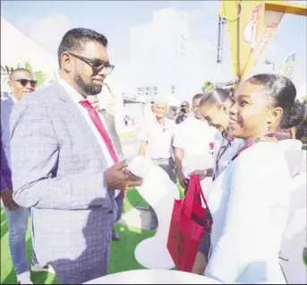  ?? ?? President Ali engaging attendees at the opening of Guyana’s Third Internatio­nal Energy forum earlier this week.