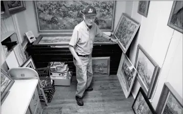  ?? ASSOCIATED PRESS ?? IN THIS JUNE 29 PHOTO, Leroy Jazwick talks about the collection of Archie B. Teater paintings at the Hagerman Valley Historical Society Museum in Hagerman, Idaho.