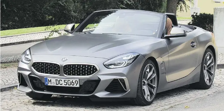  ?? PHOTOS: COSTA MOUZOURIS/DRIVING ?? BMW boosted performanc­e on the new Z4, turning it from a somewhat leisurely roadster into a high-performanc­e sports car with a removable top.