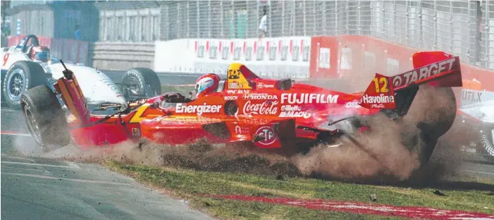  ??  ?? John Morris was in the right place at the right time to capture Jimmy Vasser’s high-speed crash in the 1998 Gold Coast Indy. Fortunatel­y Vasser was unhurt and able to walk from the wreckage.