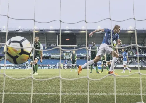  ??  ?? 0 Molde’s talented striker Erling Braut Haaland turns to celebrates his second goal of the night against Hibs which made the score 3-0.