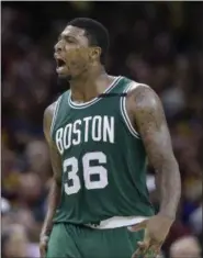  ?? TONY DEJAK — ASSOCIATED PRESS ?? The Celtics’ Marcus Smart reacts after hitting a 3-pointer against the Cavaliers on May 21.