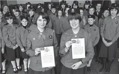  ??  ?? Sandra Latham and Fiona Gosling with their Queen’s Guides awards in 1980. Ref:132383-2