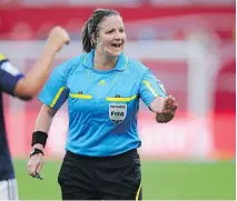  ?? PATRIK STOLLARZ/AFP/GETTY IMAGES ?? Canadian referee Carol Anne Chénard has worked at the 2011 World Cup, as well as the 2012 London Olympics.