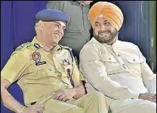  ?? GURPREET SINGH/HT ?? Local bodies minister Navjot Singh Sidhu and Punjab DGP Suresh Arora at a function in Ludhiana on Sunday.