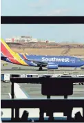  ??  ?? Federal regulators have threatened to ground dozens of Southwest Airlines jets if the airline can’t confirm the safety of some planes. JULIO CORTEZ/AP