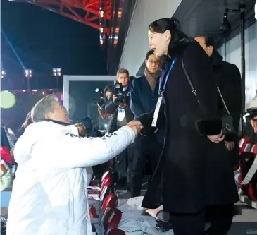  ?? REUTERS ?? South Korean President Moon Jae-in shakes hands with Kim Yo-jong, sister of North Korean leader Kim Jong-un and the first member of her family to visit the South since the Koreas separated, at the opening of the Pyeongchan­g Winter Olympics yesterday.