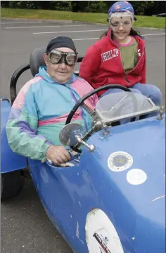  ??  ?? Frank Nuttall from Kilmacanog­ue with his grandaught­er Sarah Hussain and his 1949 Ford.