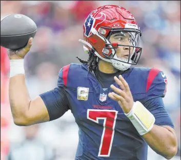  ?? Eric Christian Smith The Associated Press ?? Texans QB C.J. Stroud is a lock to win the Offensive Rookie of the Year award, barring injury. Houston faces the Jaguars on Sunday in an AFC South showdown.