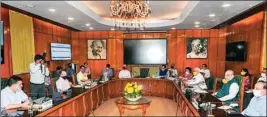  ?? PTI ?? Union Home Minister Amit Shah (2nd R), holds a meeting with Health Minister Harsh Vardhan (R), Delhi CM Arvind Kejriwal (L) and others to iscuss the COVID-19 situation in Delhi, at North Block on Sunday