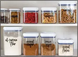  ?? GETTY IMAGES ?? The pantry is a place where bins are a must, both for organizing and for saving space by reducing packaging. Create a uniform look with clear acrylic or wire containers you can see into. They make cooking and putting food away faster and more efficient.