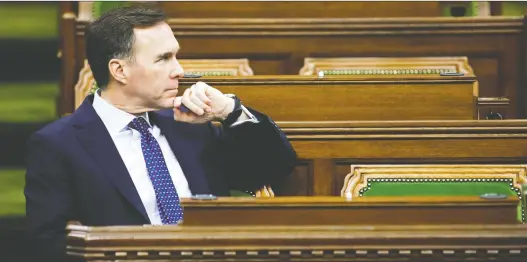  ?? BLAIR GABLE/REUTERS ?? Finance Minister Bill Morneau announced the new loan program LEEFF Monday for large companies. The feds want the option to take shares in participat­ing firms.