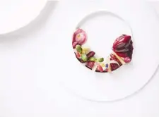  ??  ?? (from top) Chef Julien Royer launched Odette less than two years ago, and has since won many accolades; one of Odette’s signatures is this brightly coloured heirloom beetroot variation dish.