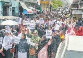  ?? PTI ?? People stage a protest against controvers­ial remarks about Prophet Mohammed, in Kota.