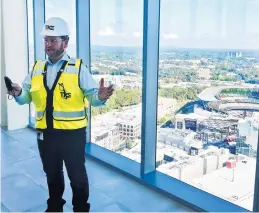  ?? JEFF MARTIN/AP ?? Kevin Lavallee, CEO of TK Elevators’ North American operations, shows off the company’s elevator testing facility northwest of Atlanta. The facility is to open in 2022.