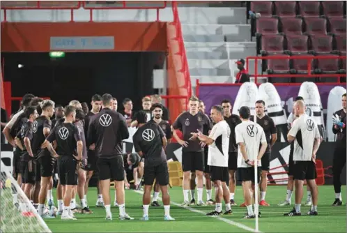  ?? (AFP) ?? Germany’s head coach Hans-Dieter Flick leads a training session of his team at the Al Shamal Stadium in Al Shamal, north of Doha on Wednesday.