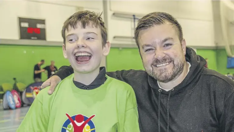  ?? ?? TV star Alex Brooker supported over 100 pupils with disabiliti­es and special needs at an inclusive sports competitio­n in Halifax this week.