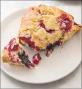  ?? The Associated Press ?? This slice of mixed berry scone comes from a recipe in the cookbook All-Time Best Brunch.