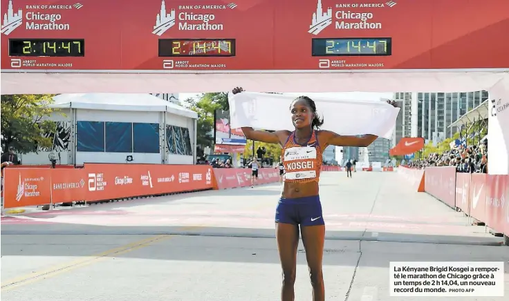  ?? PHOTO AFP ?? La Kényane Brigid Kosgei a remporté le marathon de Chicago grâce à un temps de 2 h 14,04, un nouveau record du monde.